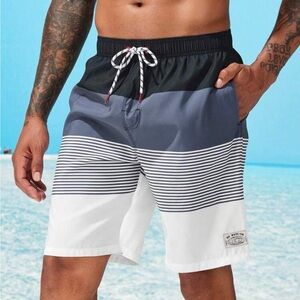 Men's Blue and White Swim Shorts size L and XL available!!  Never worn.